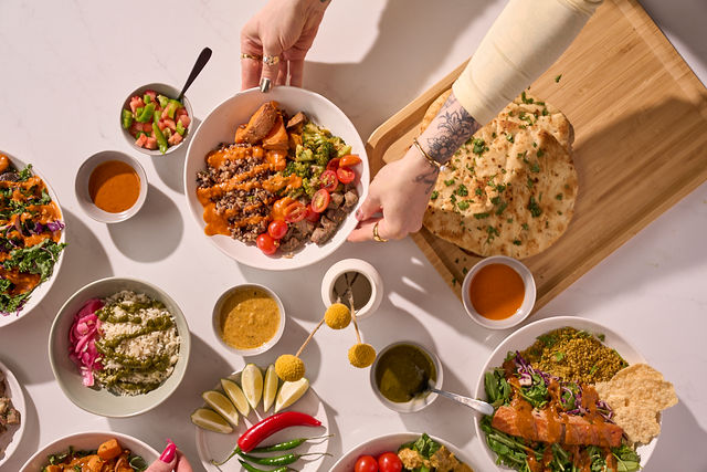 A full Tikka spread of bowls, sauces and flatbread